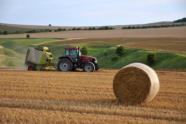 When divorce happens: an eight point plan for farming families - shown by a tractor with hay bale
