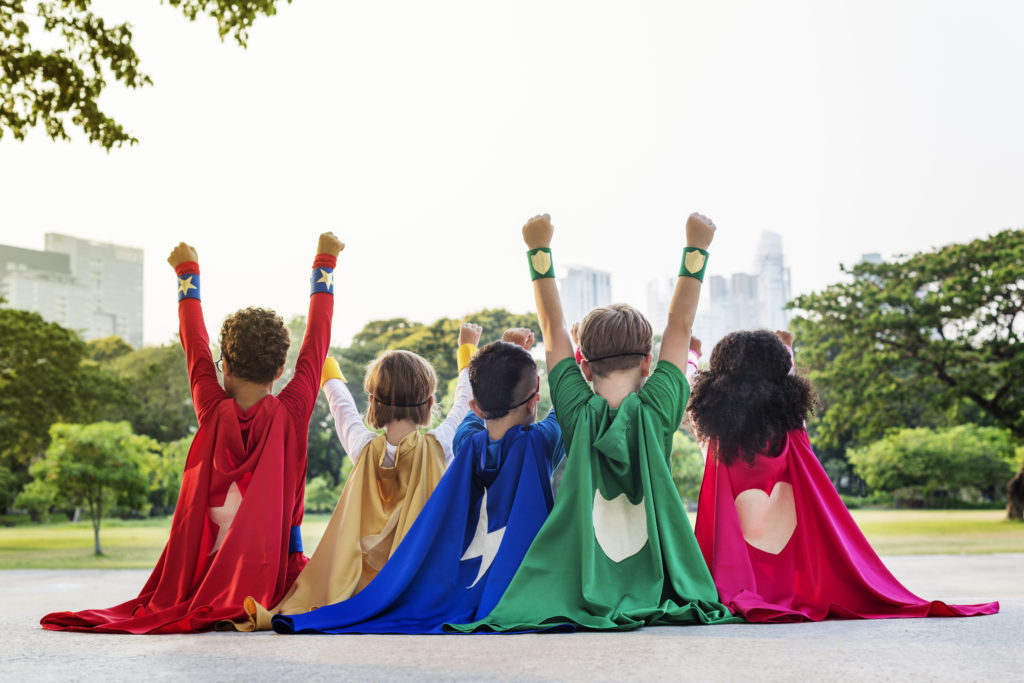 children dressed as super heroes