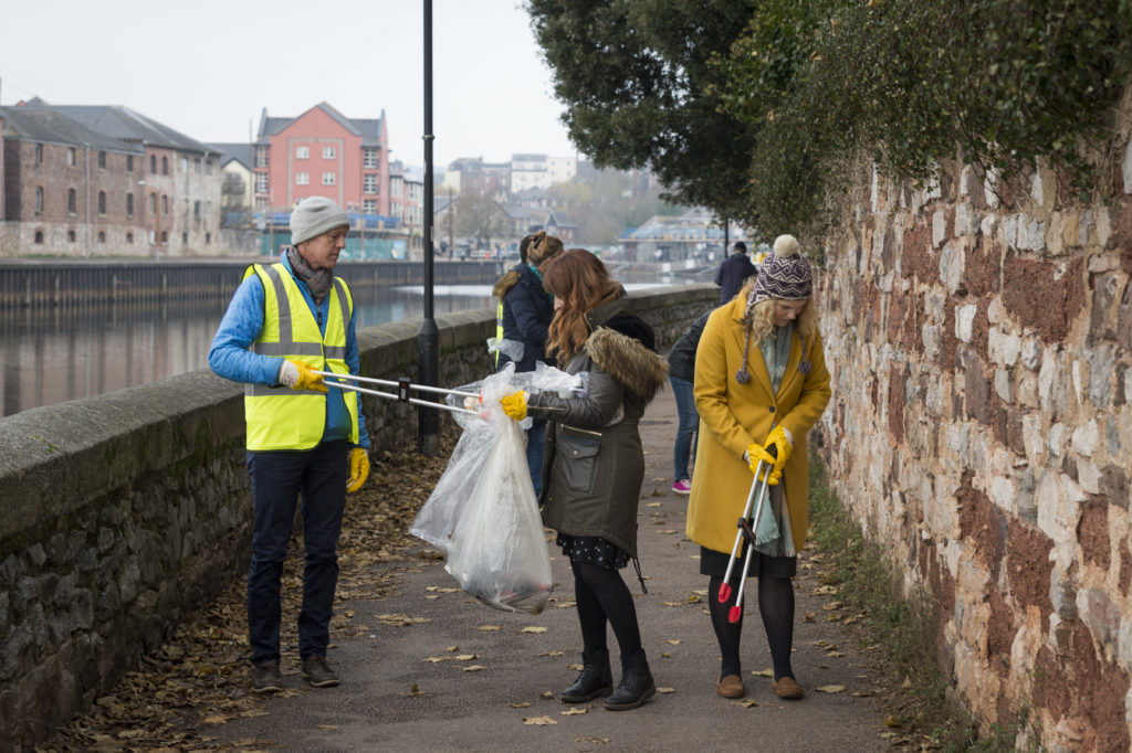 photo of people collecting rubbish at moye quay