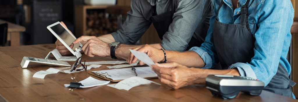 Staff calculating restaurant bill