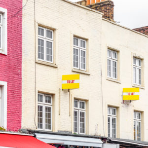 Colourful terraced houses with TO LET signs around Camden Town in London
