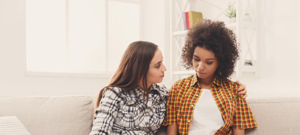 Two women talking about problems at home