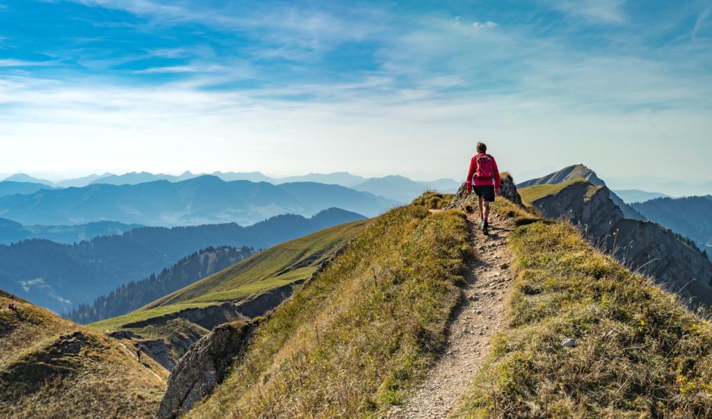 Person walking along mountain path