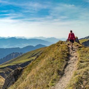 Person walking along mountain path