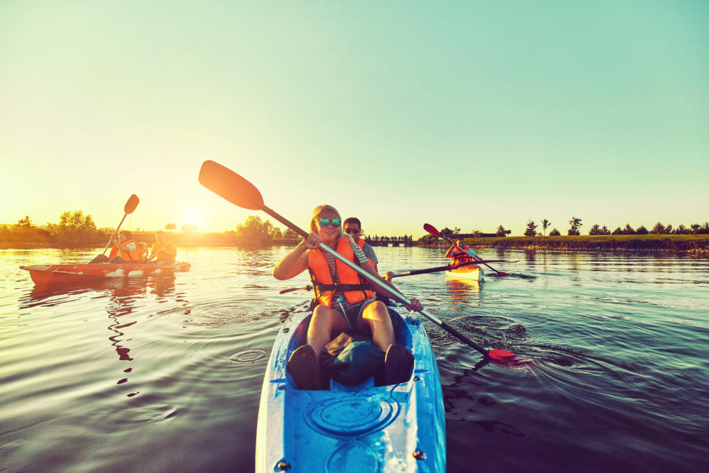 People kayaking on a lake