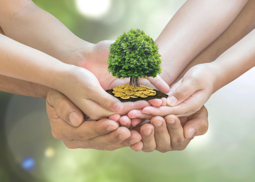Retirement planning and family investment concept with wealthy tree growing on parent -children's hands