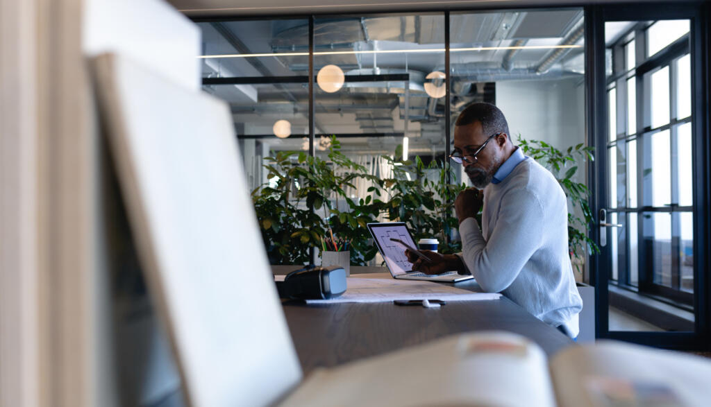 African American man working in modern office