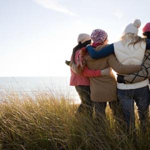 Female friends by the sea