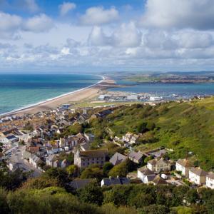 view overlooking Dorset beach town and coastline