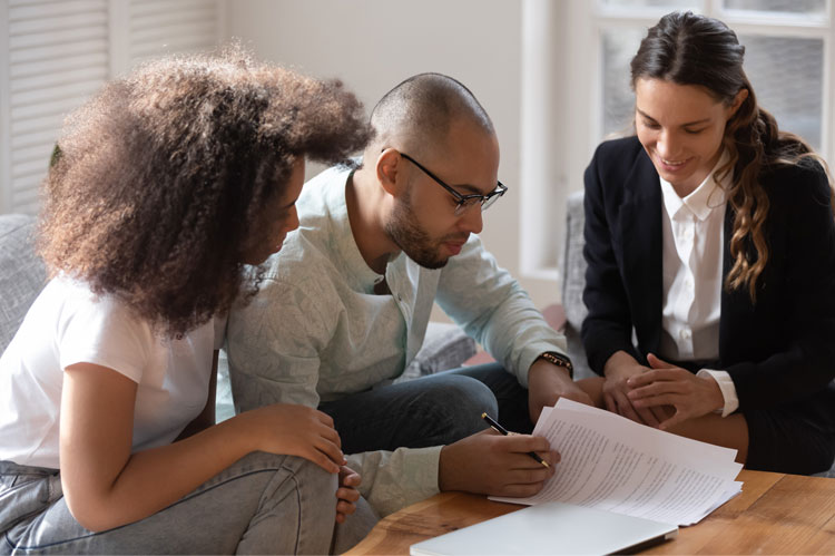 couple sign pre-nups with legal professional present