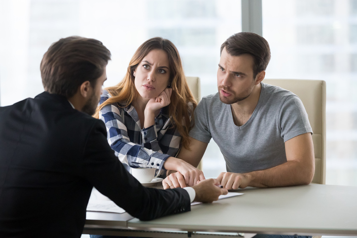 three people sitting at a table discuss 1975 Act time limit extension