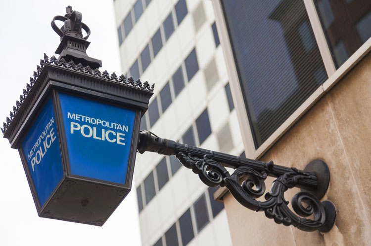 Metropolitan Police lamp sign outside police station