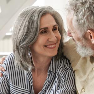 happy woman looking at husband after deciding to change mind about getting divorced