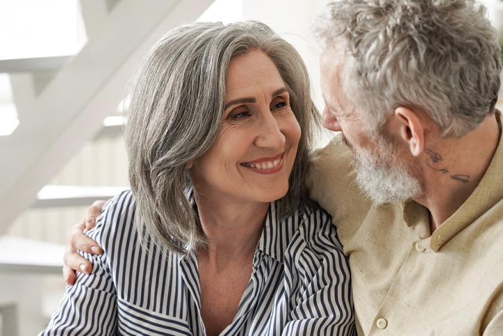 happy woman looking at husband after deciding to change mind about getting divorced