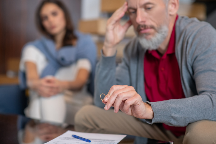 Photo showing a divorced couple discussing pension sharing when there is an age gap