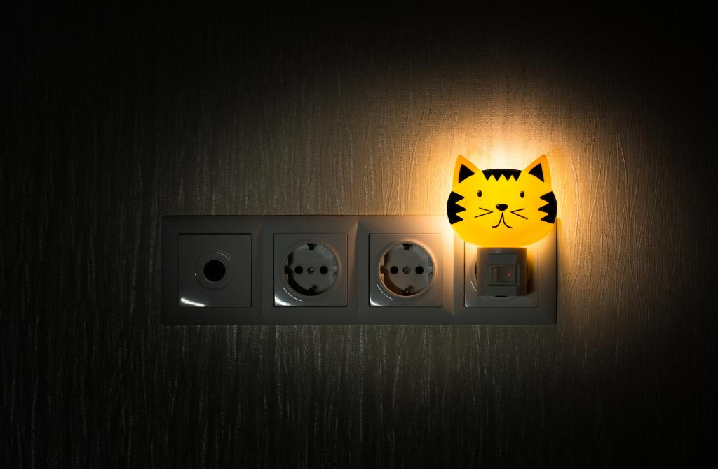 Night Light installed in the socket in the room of baby.