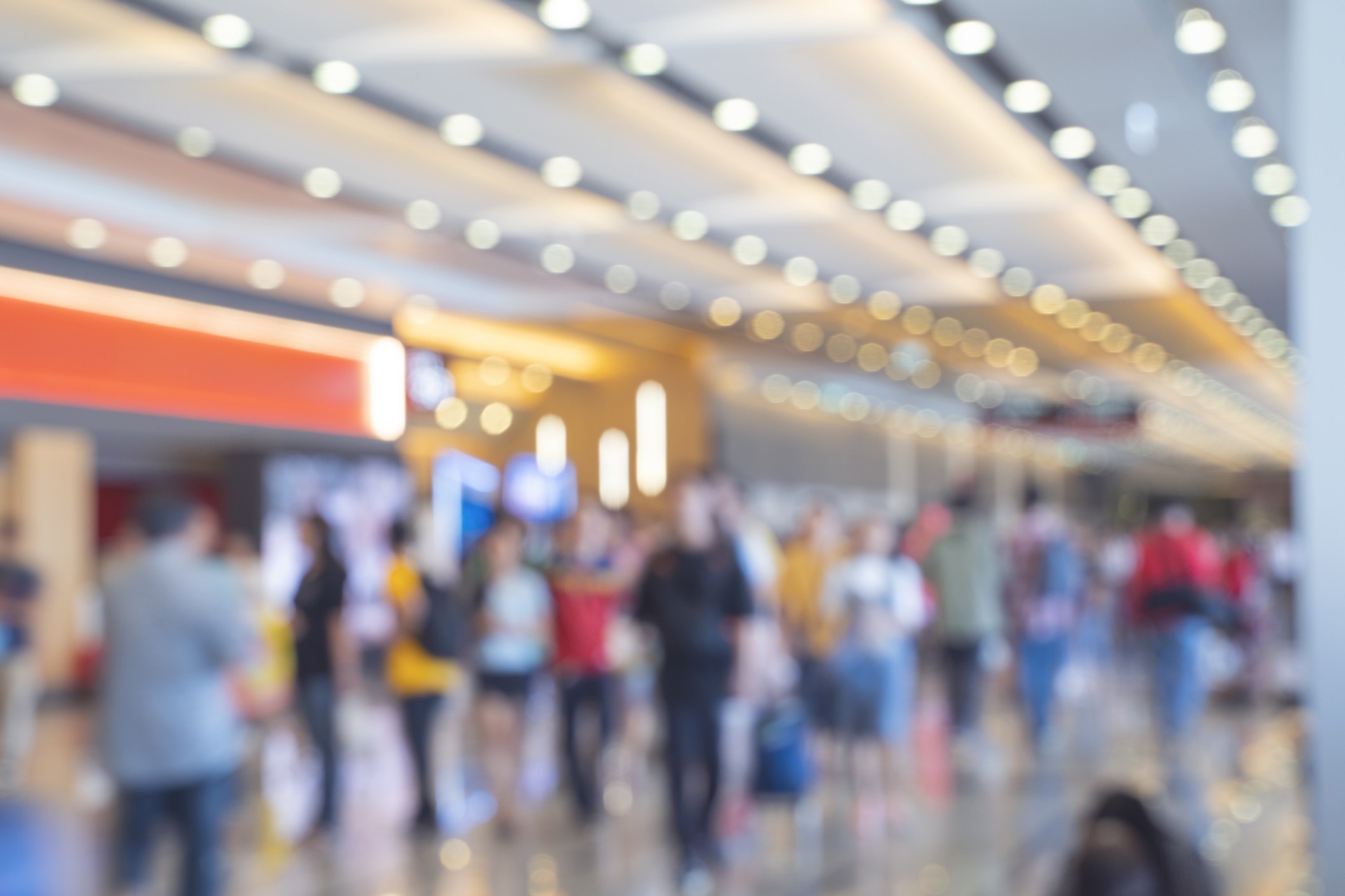 Blurred photograph showing a crowded event space