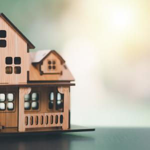 Photograph of a miniscule building made out of wood