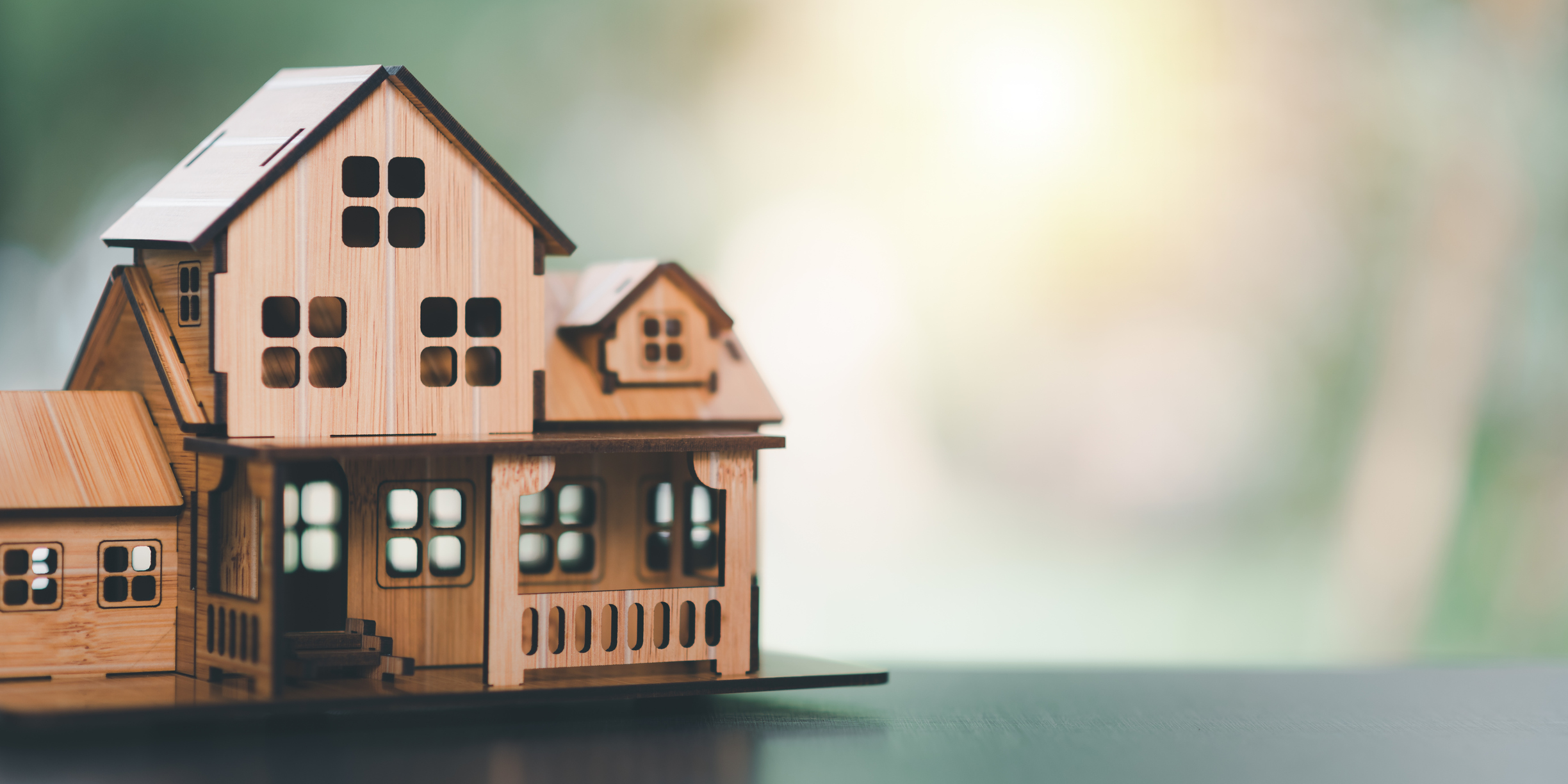 Photograph of a miniscule building made out of wood