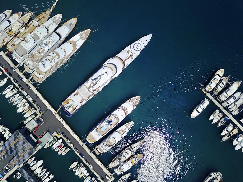Aerial view of yachts of various sizes in a harbour