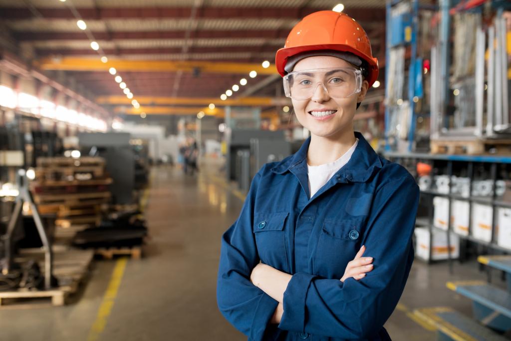 Young smiling female technician in blue uniform