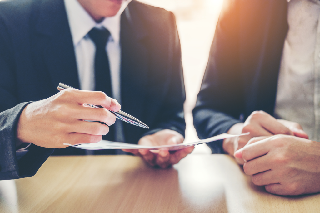 Two business people reviewing a document