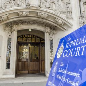 Exterior signage and entrance to the Supreme Court.
