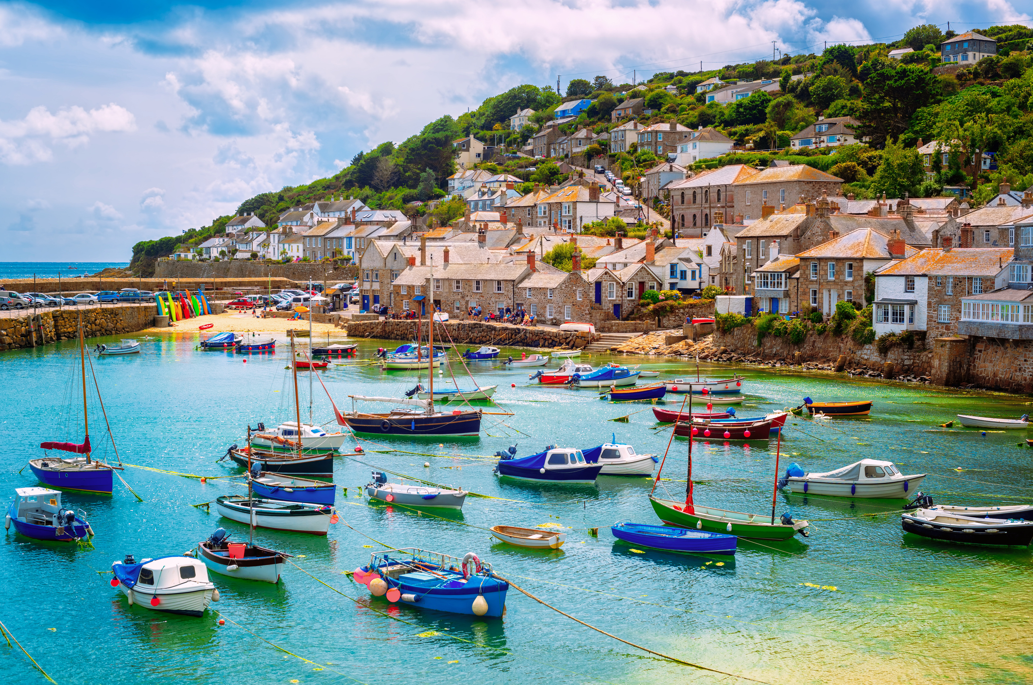 Photograph of the South West fishing port of Mousehole with boats in the harbour
