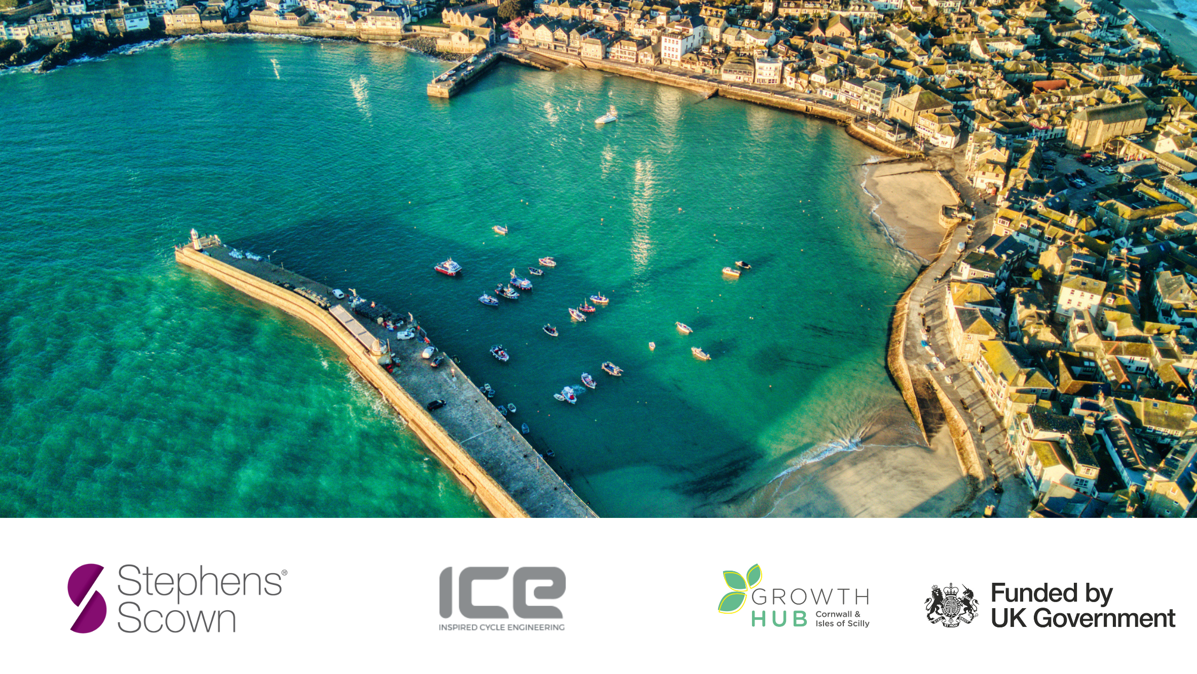 Aerial photograph of a Cornish beach to represent an employee ownership event we are hosting in Truro